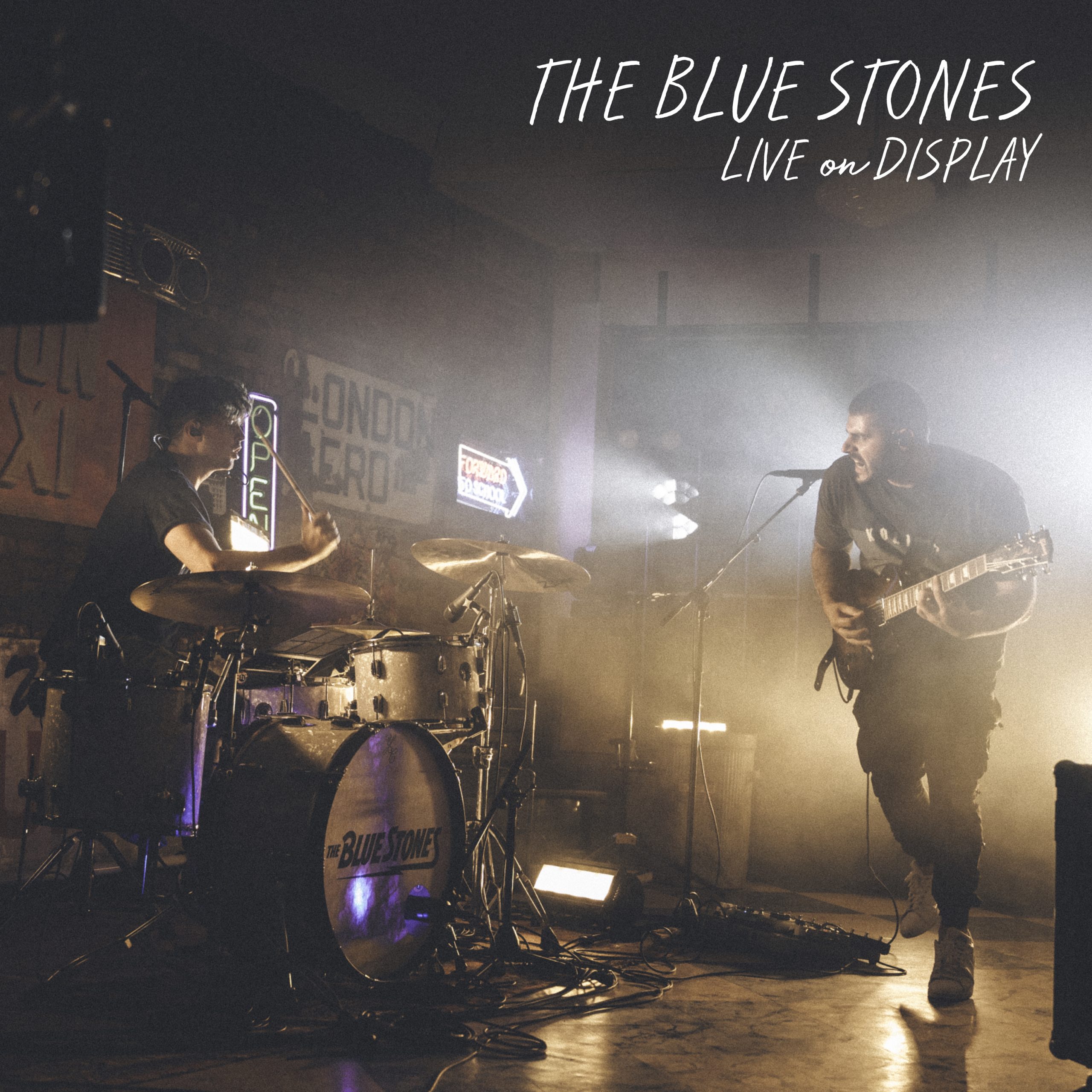 Группа камни исполнитель. Группа Blue Stone. The Blue Stones Band. Рок группа the Blue Stone. The Blue Stones - Rolling with the Punches.